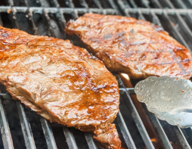 locally grown beef steaks on a grill